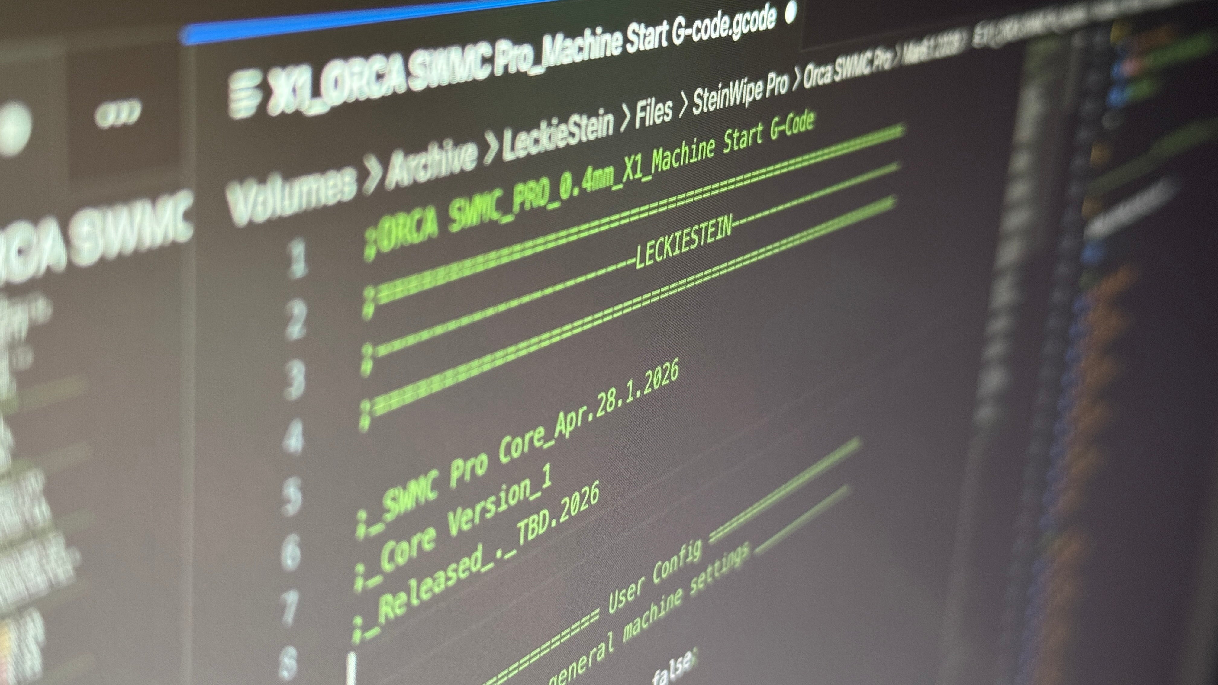 Computer screen displaying Leckiestein code and file system navigation on a dark background