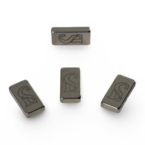 Four rectangular magnets with a logo on a white background